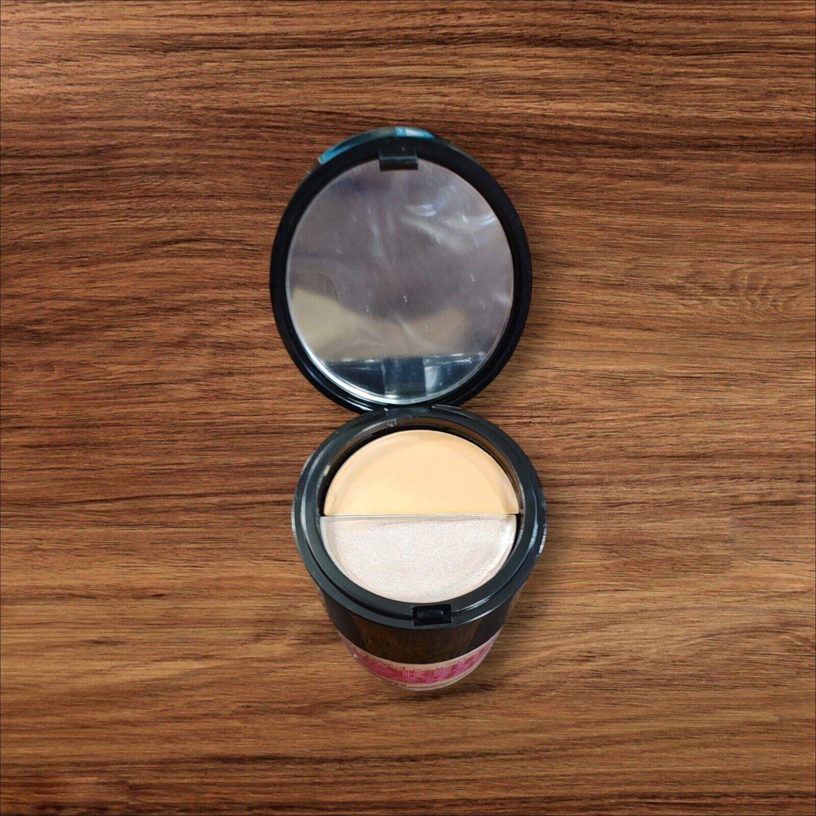 Foundation Cream Compact features a dual-tone design with a smooth texture.