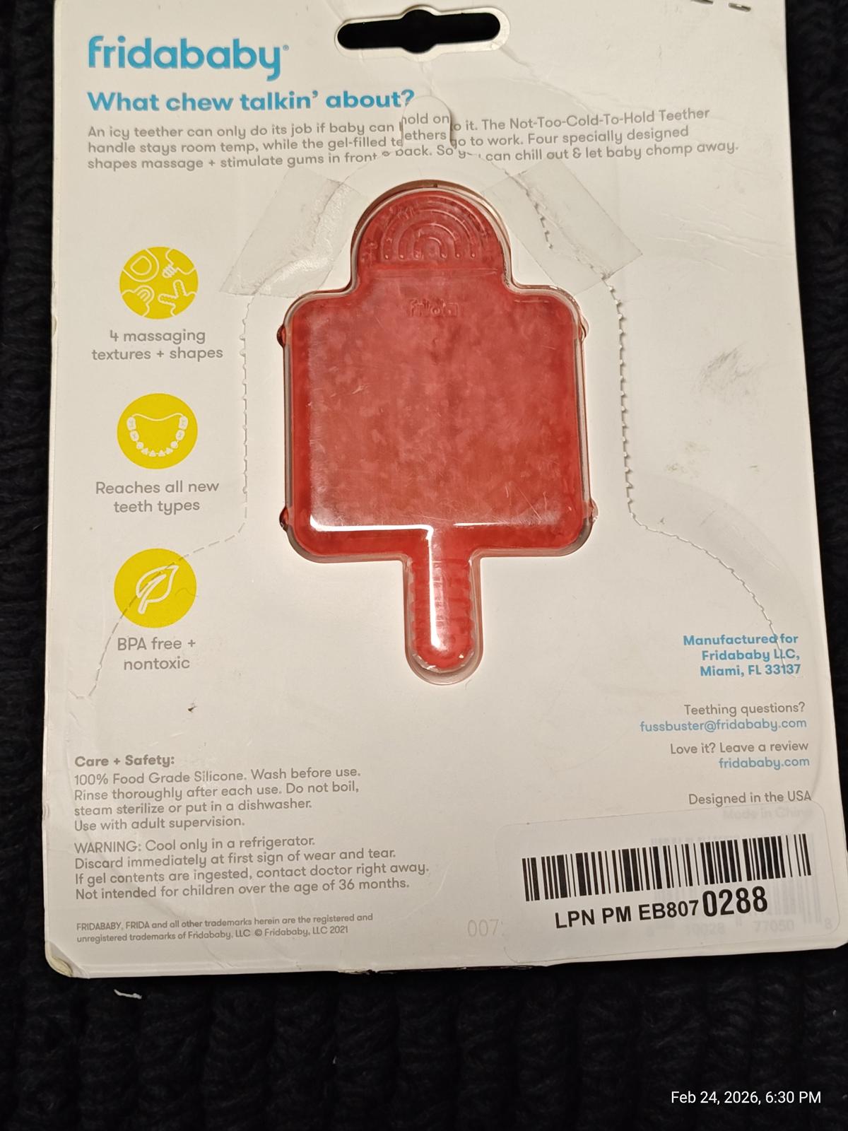 Fridababy What Chew Talkin' About popsicle teether in red color, designed for soothing gums.