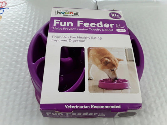Fun Feeder promotes healthy eating and improves digestion for dogs, featuring a purple design.