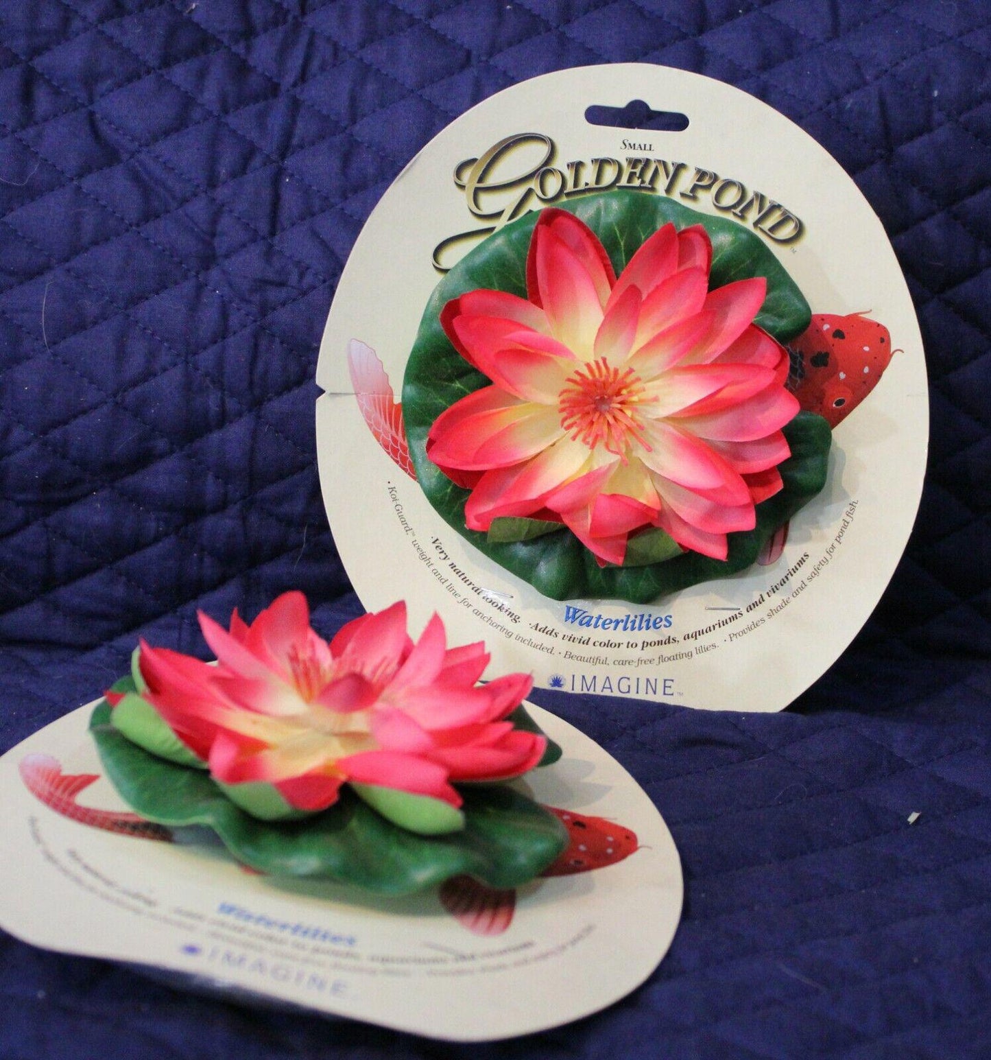 Golden Pond artificial pink water lilies with green leaves, perfect for decorative use.
