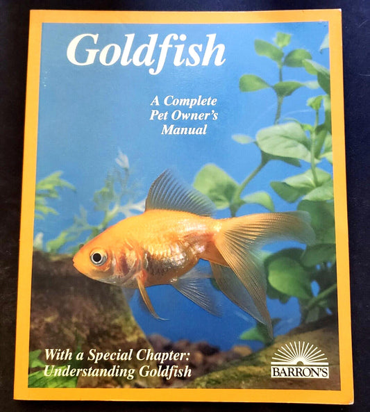 Goldfish pet owner's manual featuring a goldfish swimming among aquatic plants.