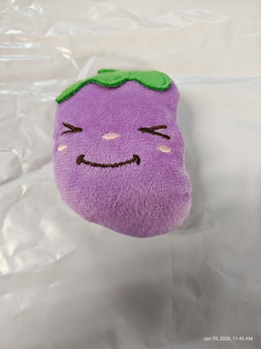 Grape Plush Toy with a smiling face and green leaf details.