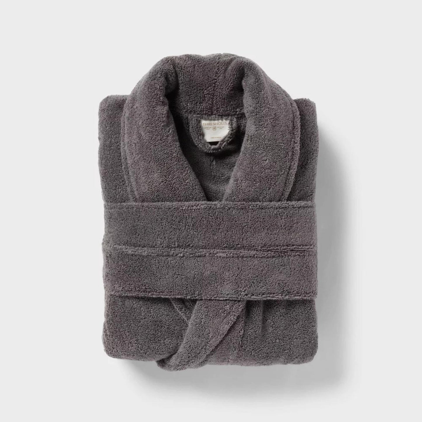 Gray bathrobe featuring a soft, plush texture and a cozy wrap design.