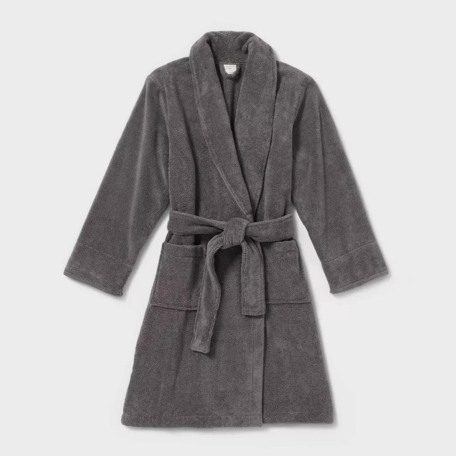 Gray bathrobe featuring a soft texture and a belted waist for comfort.