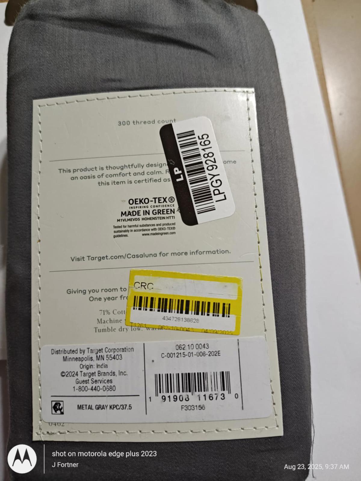 Gray bed sheet set made in green, featuring Oeko-Tex certification label.