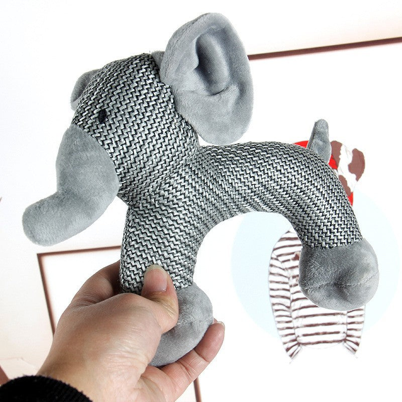 Elephant plush toy with a textured gray fabric, perfect for cuddling and playtime.