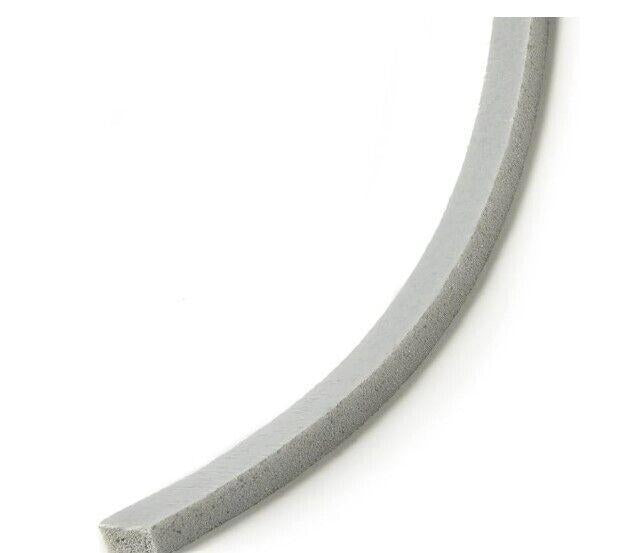 Gray foam weather stripping for sealing gaps and improving insulation.