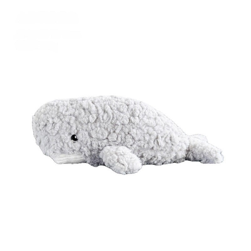 Gray plush whale toy with a soft, fluffy texture and small black eyes.