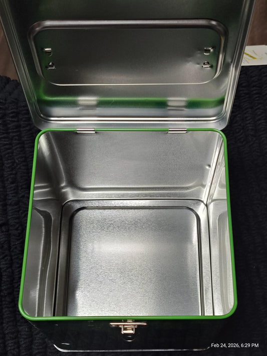 Green metal storage box with a shiny interior, perfect for organizing items.