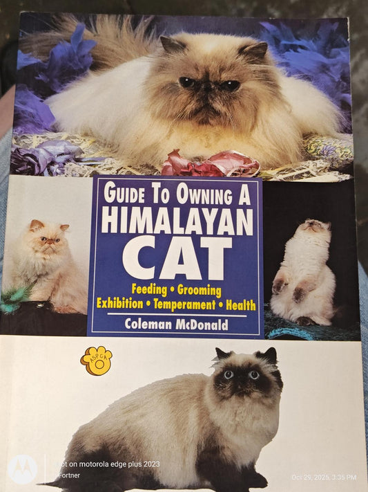 Guide to Owning a Himalayan Cat book cover featuring a fluffy Himalayan cat and kittens.