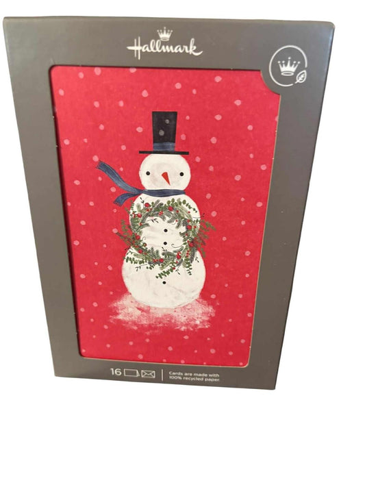 Hallmark Christmas cards featuring a snowman with a wreath on a red background.