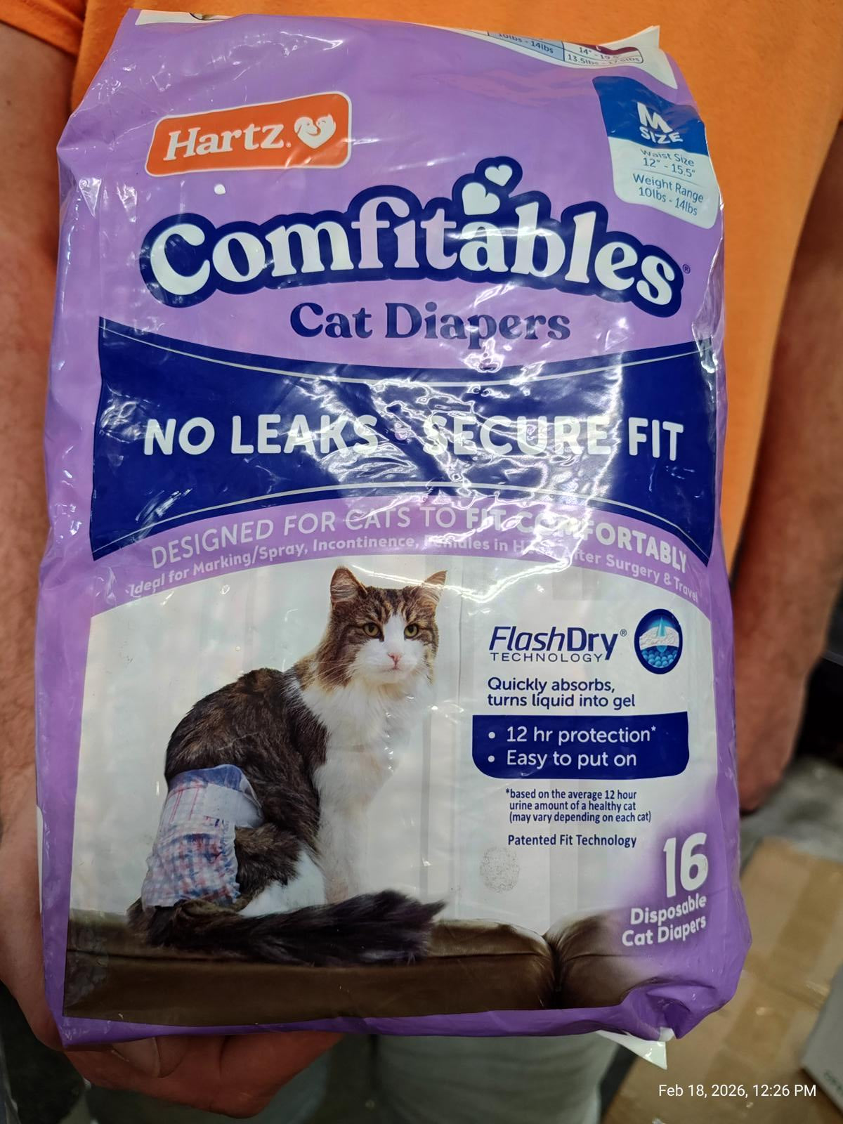 Hartz Comfitables cat diapers in purple packaging, featuring a cat wearing a diaper and highlighting FlashDry technology.