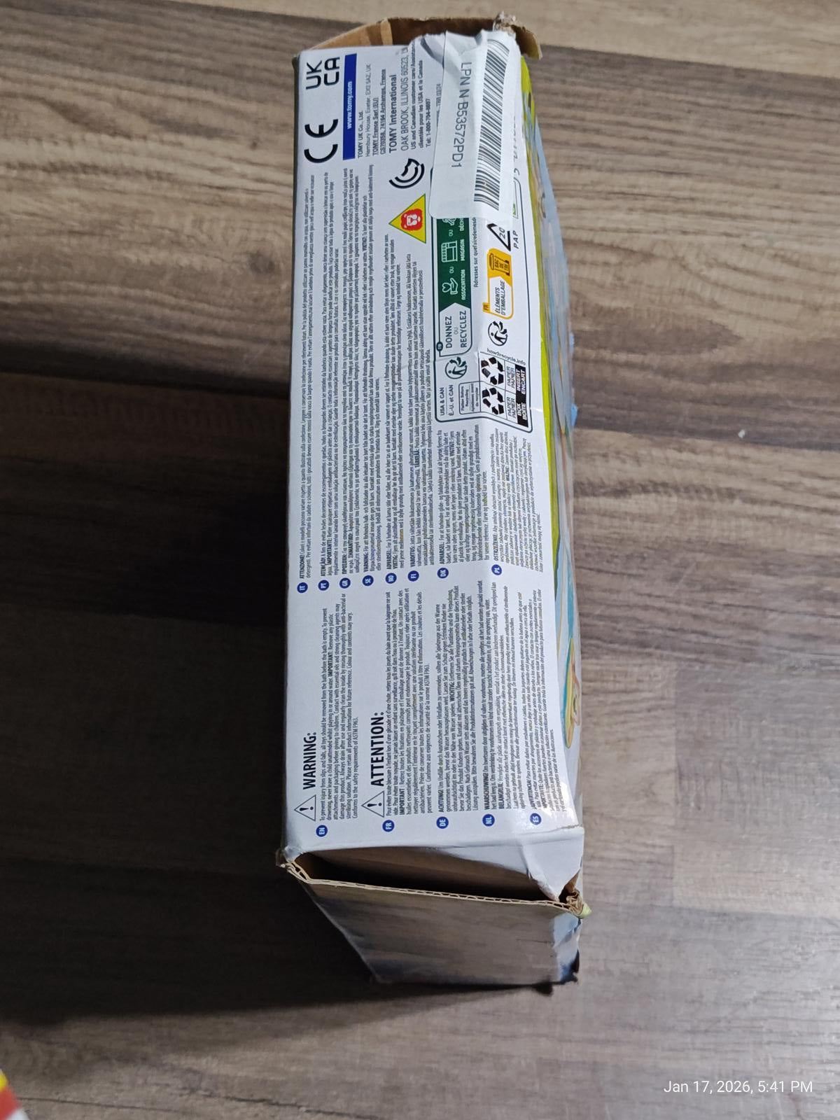 Product packaging showing detailed information and labels on the side.
