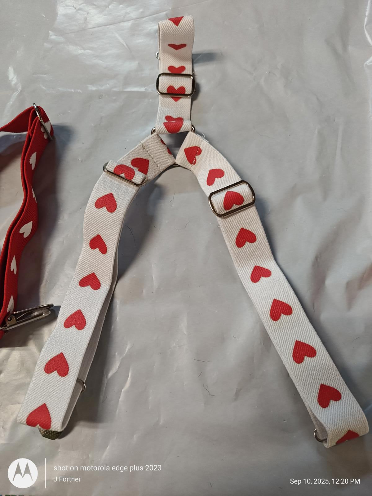 Heart Pattern Suspenders featuring red hearts on a white background, adjustable straps.