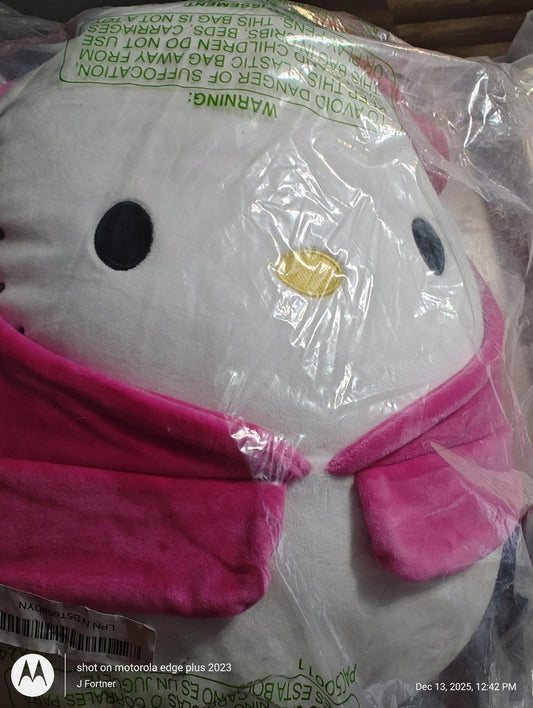 Hello Kitty plush toy with pink accents and a cheerful expression.