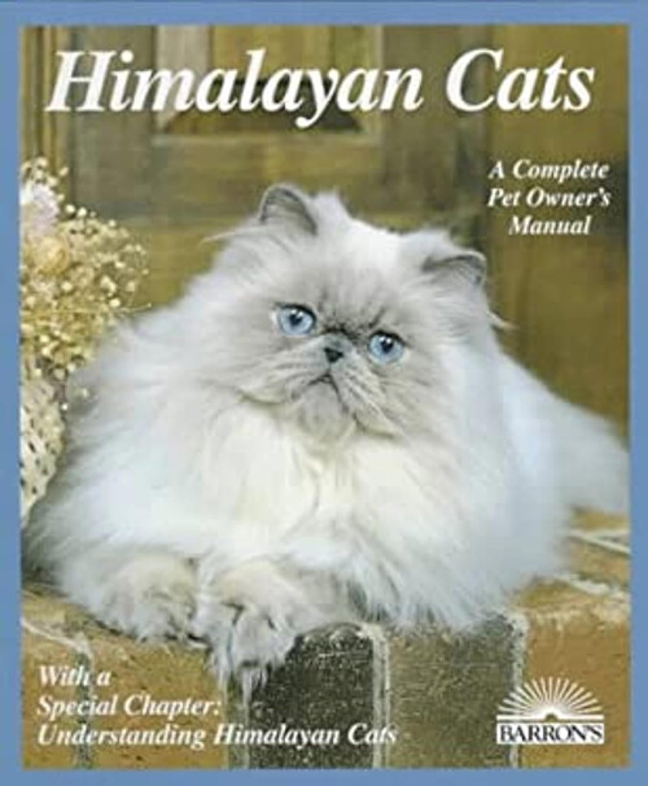 Himalayan Cats book cover featuring a fluffy white cat with blue eyes.
