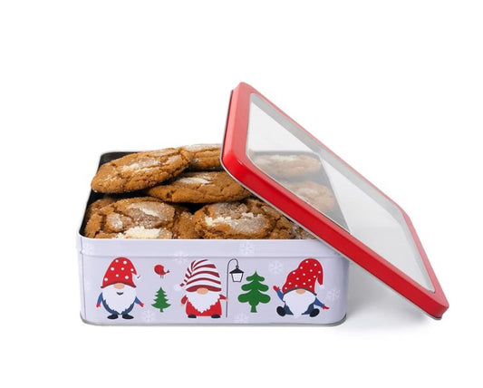 Holiday Cookie Tin with festive gnome design, filled with delicious cookies.