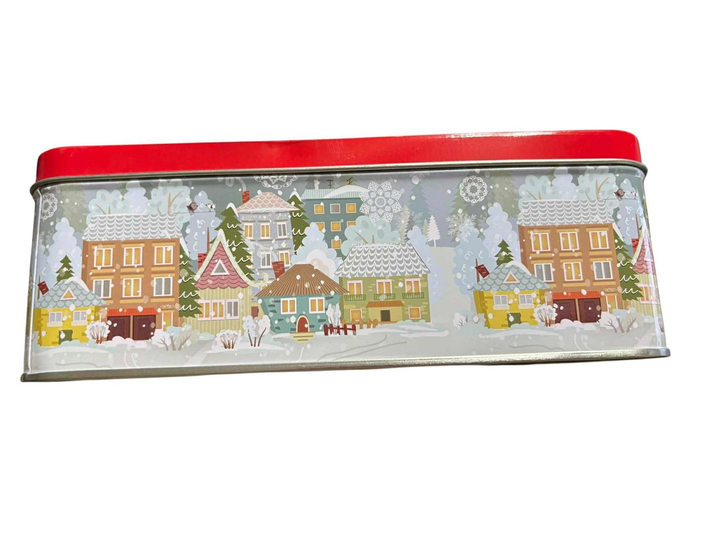Holiday Village Tin with colorful houses and snow-covered rooftops, perfect for festive gifting.