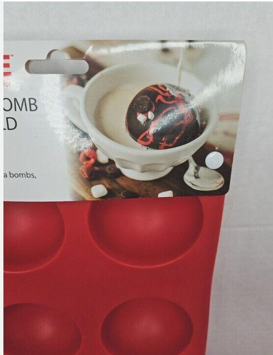 Chocolate bomb mold for making hot cocoa bombs, featuring a red silicone design.