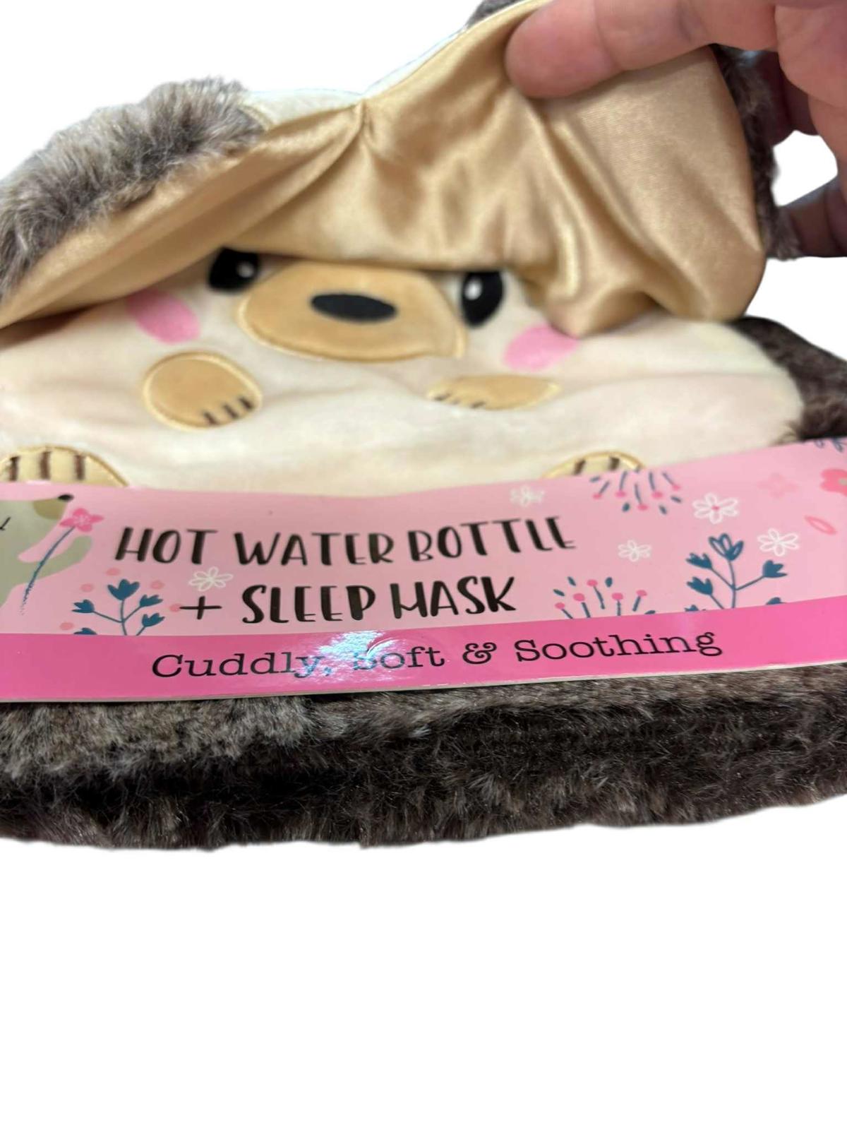 Hot water bottle and sleep mask set featuring a cute animal design, soft and soothing.