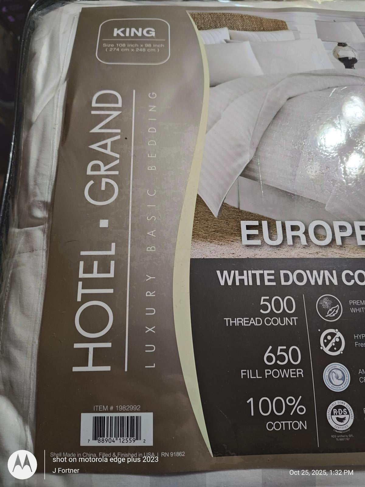 Hotel Grand King white down comforter with 500 thread count and 100% cotton fabric.