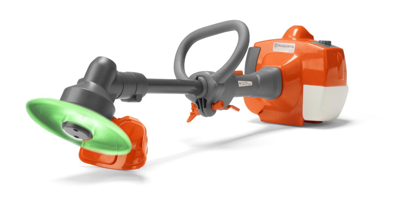 Husqvarna string trimmer with a green cutting head and orange body for efficient lawn care.