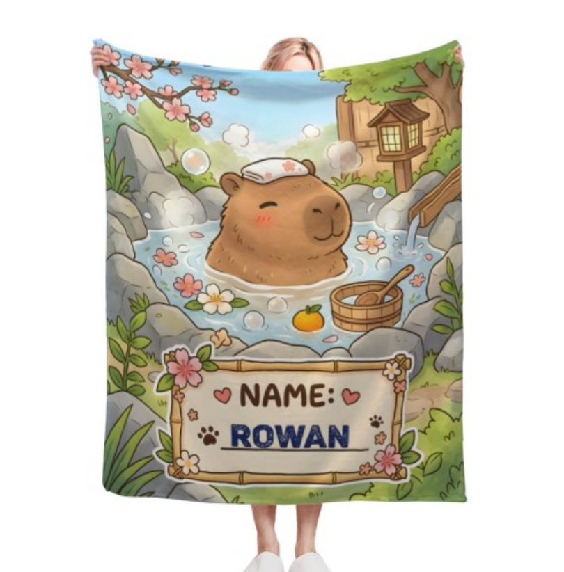 Personalized Capybara Hot Spring Blanket with Name | Kawaii Capybara in Japanese Onsen, Cherry Blossoms, Name on Bamboo Sign | Custom Gift for Capybara Lovers