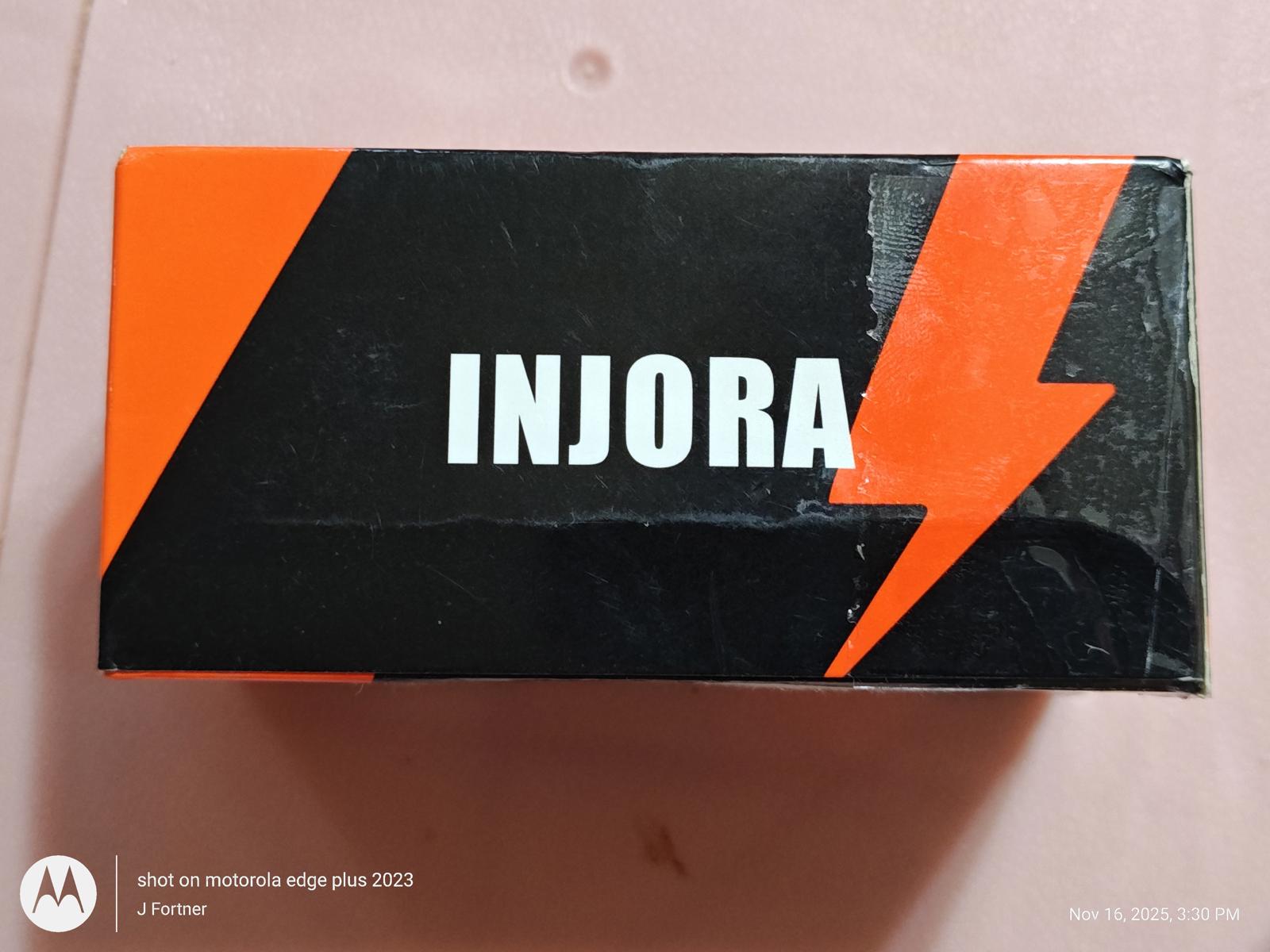 INJORA packaging box featuring a bold black and orange design with lightning bolt graphics.