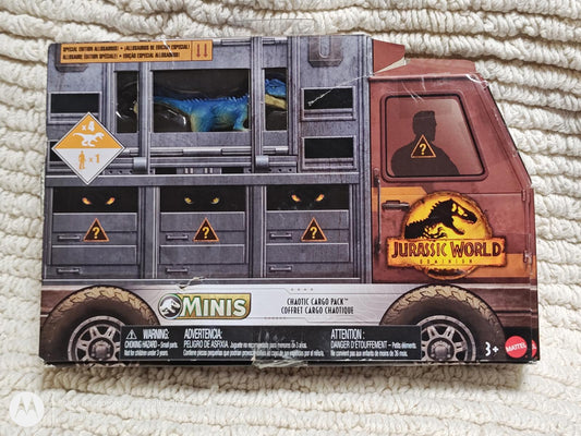 Jurassic World Minis truck toy featuring dinosaur cargo and warning signs.
