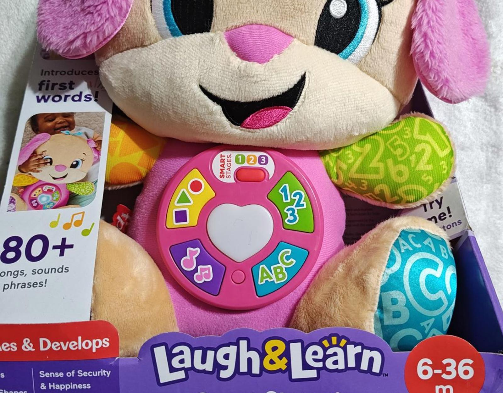 Laugh & Learn plush puppy toy with colorful buttons and educational features for infants.