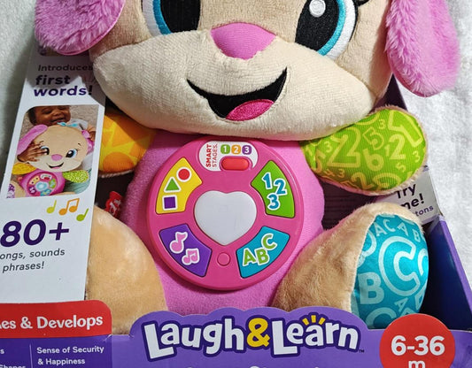 Laugh & Learn plush puppy toy with colorful buttons and educational features for infants.