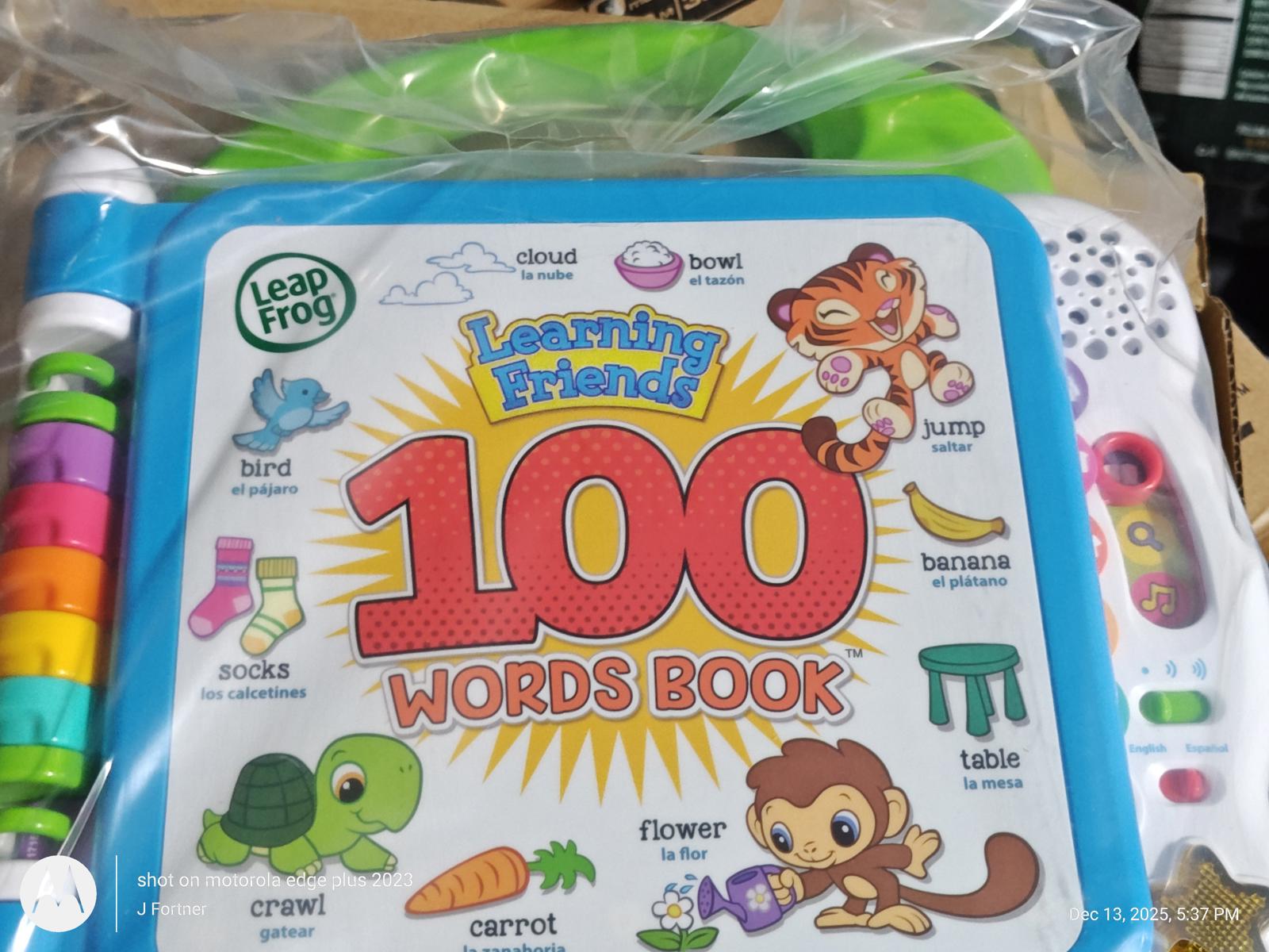 Learning Friends 100 Words Book featuring colorful illustrations and interactive buttons.
