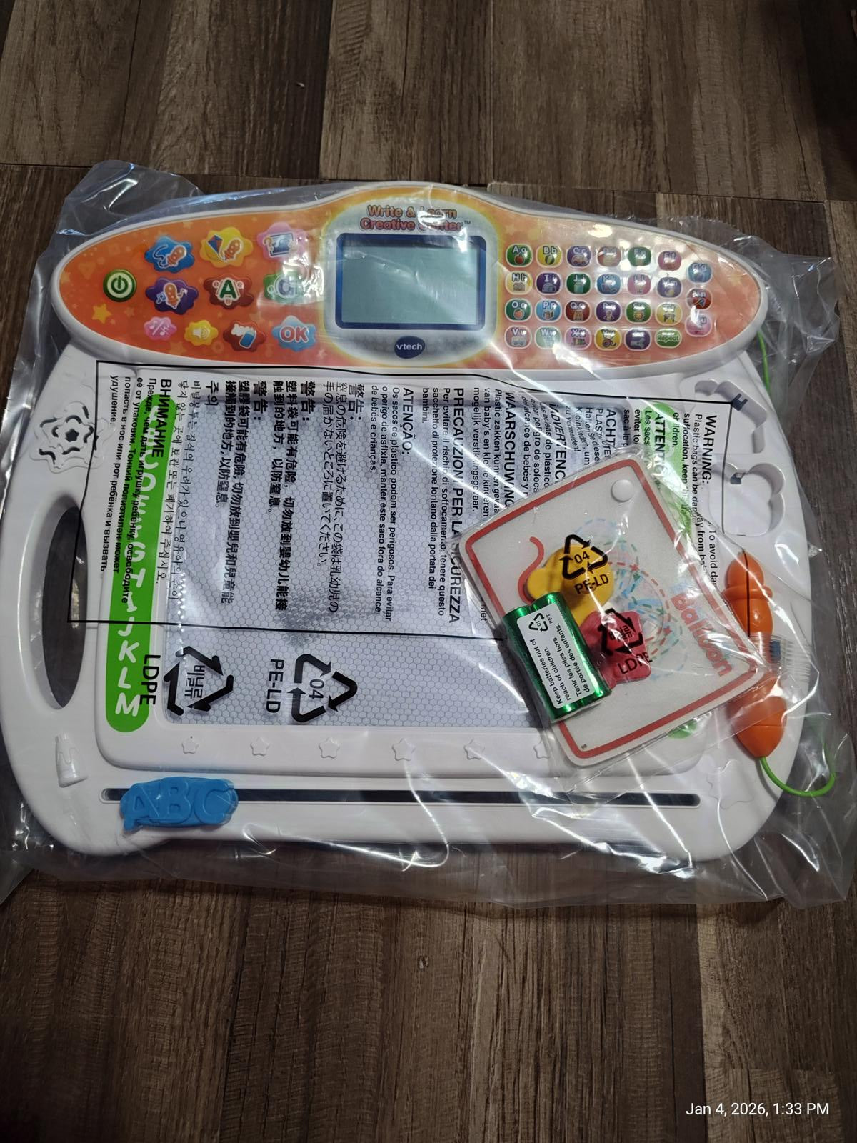 Learning Tablet for Kids with colorful buttons and interactive screen.