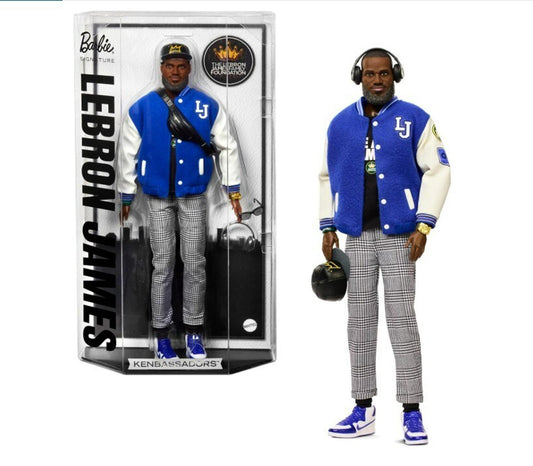 LeBron James action figure wearing a blue varsity jacket and gray pants, holding a helmet.