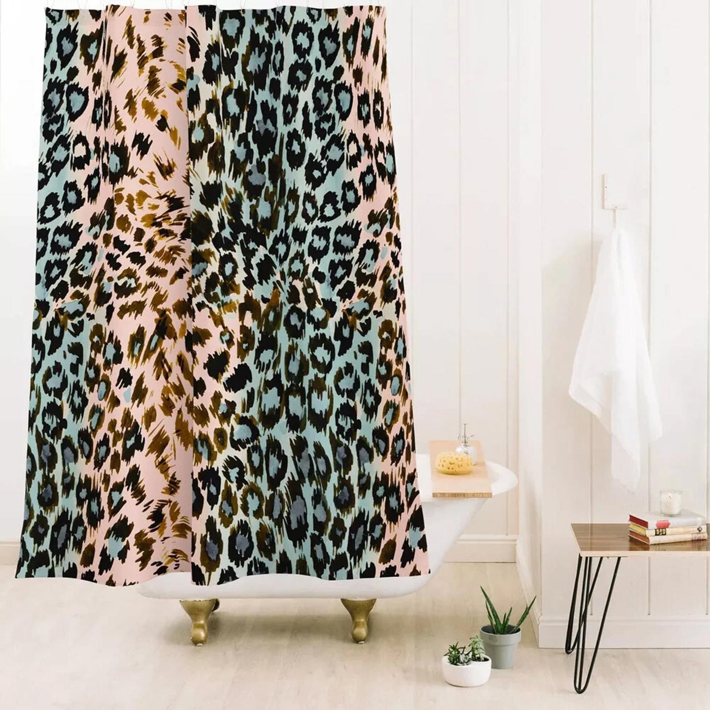 Leopard Print Shower Curtain featuring a vibrant mix of pink, blue, and brown colors.