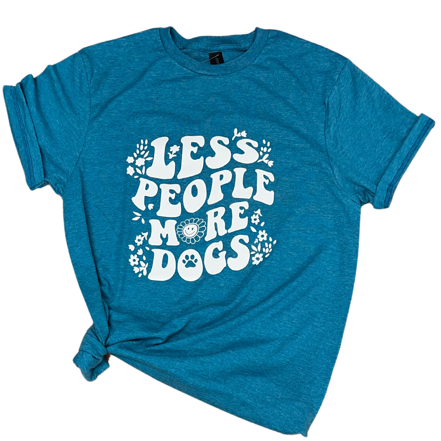 Less People More Dogs t-shirt in blue with playful typography and floral accents.