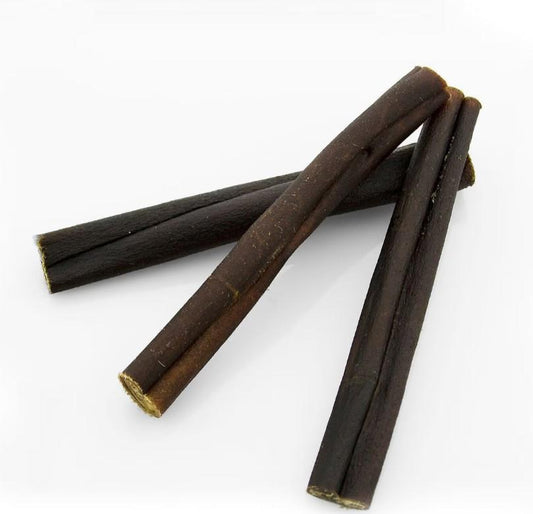 Licorice root sticks, dark brown and elongated, perfect for herbal remedies.