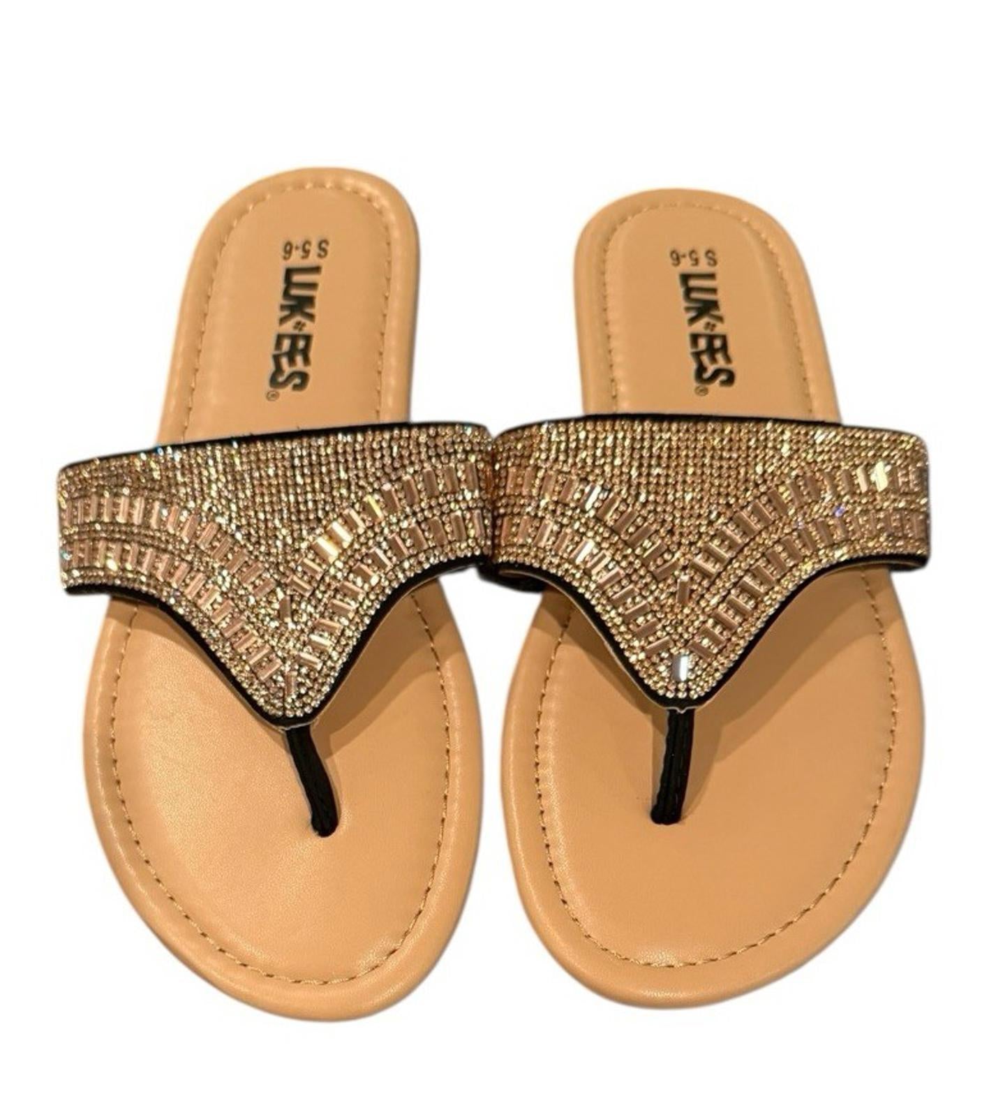 Linkees sandals featuring a sparkling rhinestone strap and a comfortable sole.