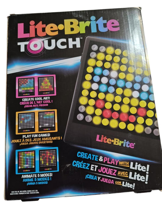 Lite-Brite Touch box featuring colorful pegs and game options for creative play.