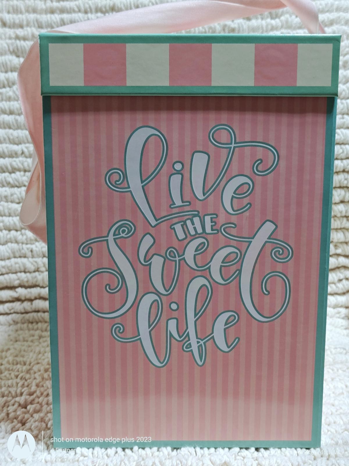 Live the Sweet Life gift box featuring pink stripes and decorative lettering.