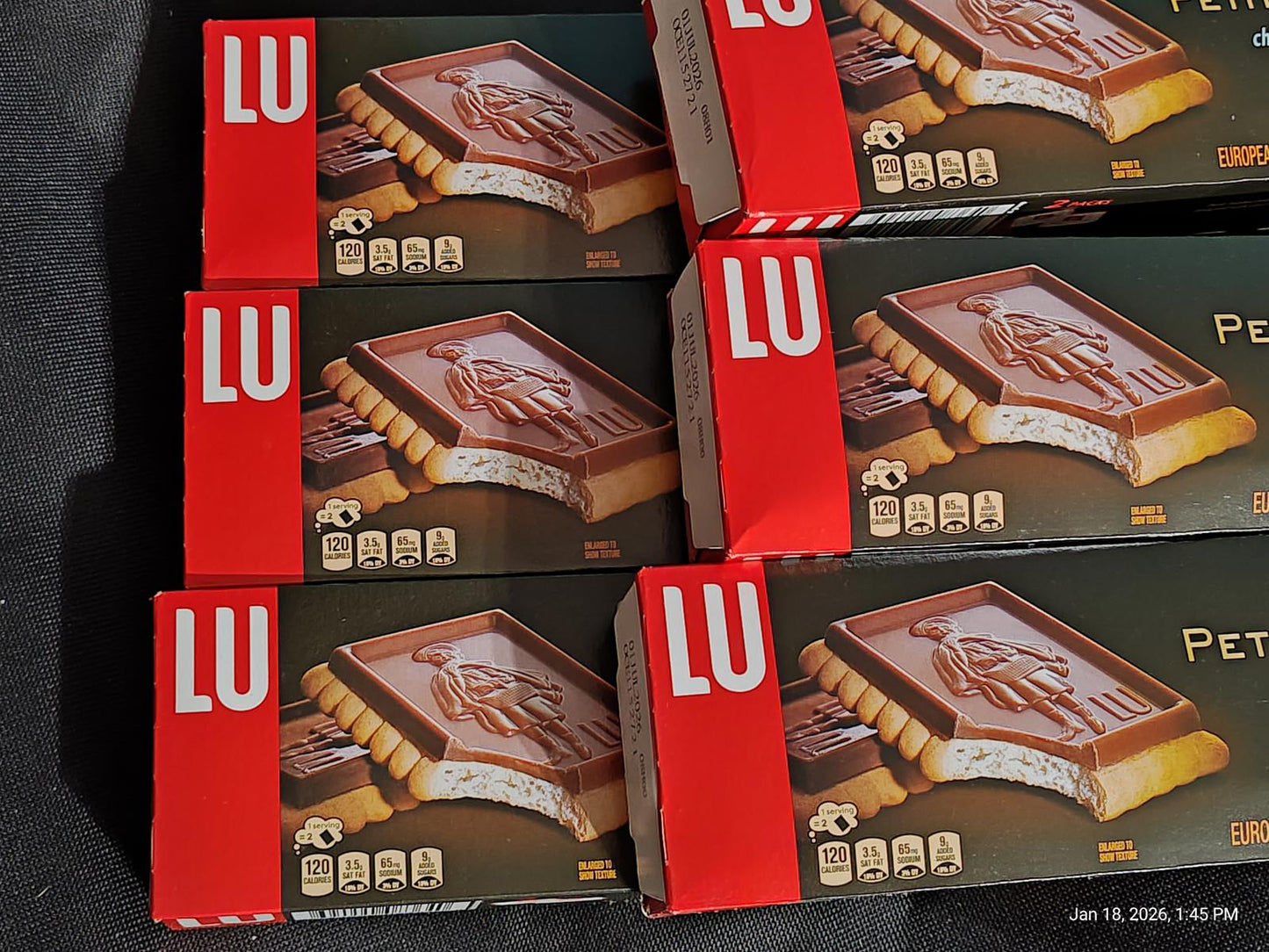 LU Petits Beurres cookies in red packaging, featuring a classic design and rich texture.