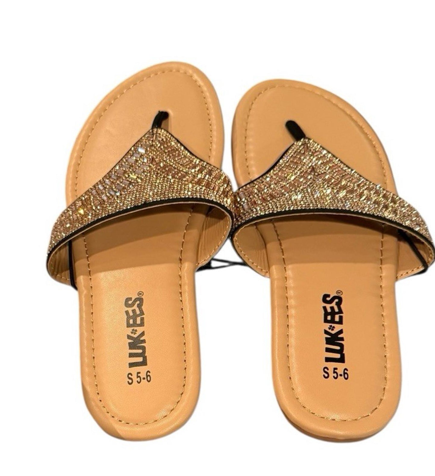 Lukees sandals featuring a sparkling gold strap and comfortable sole.