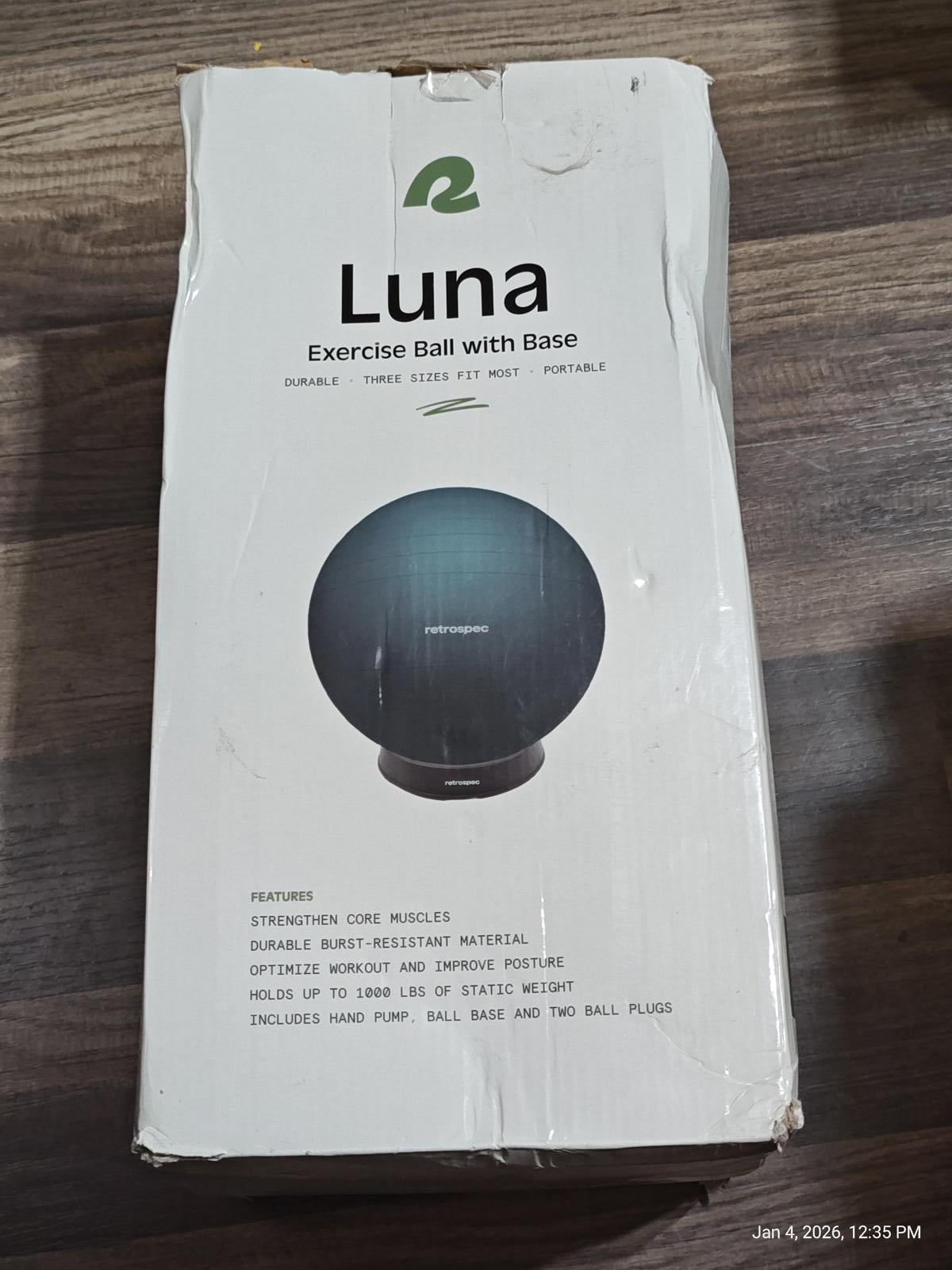 Luna exercise ball with base, durable and portable design, ideal for workouts.