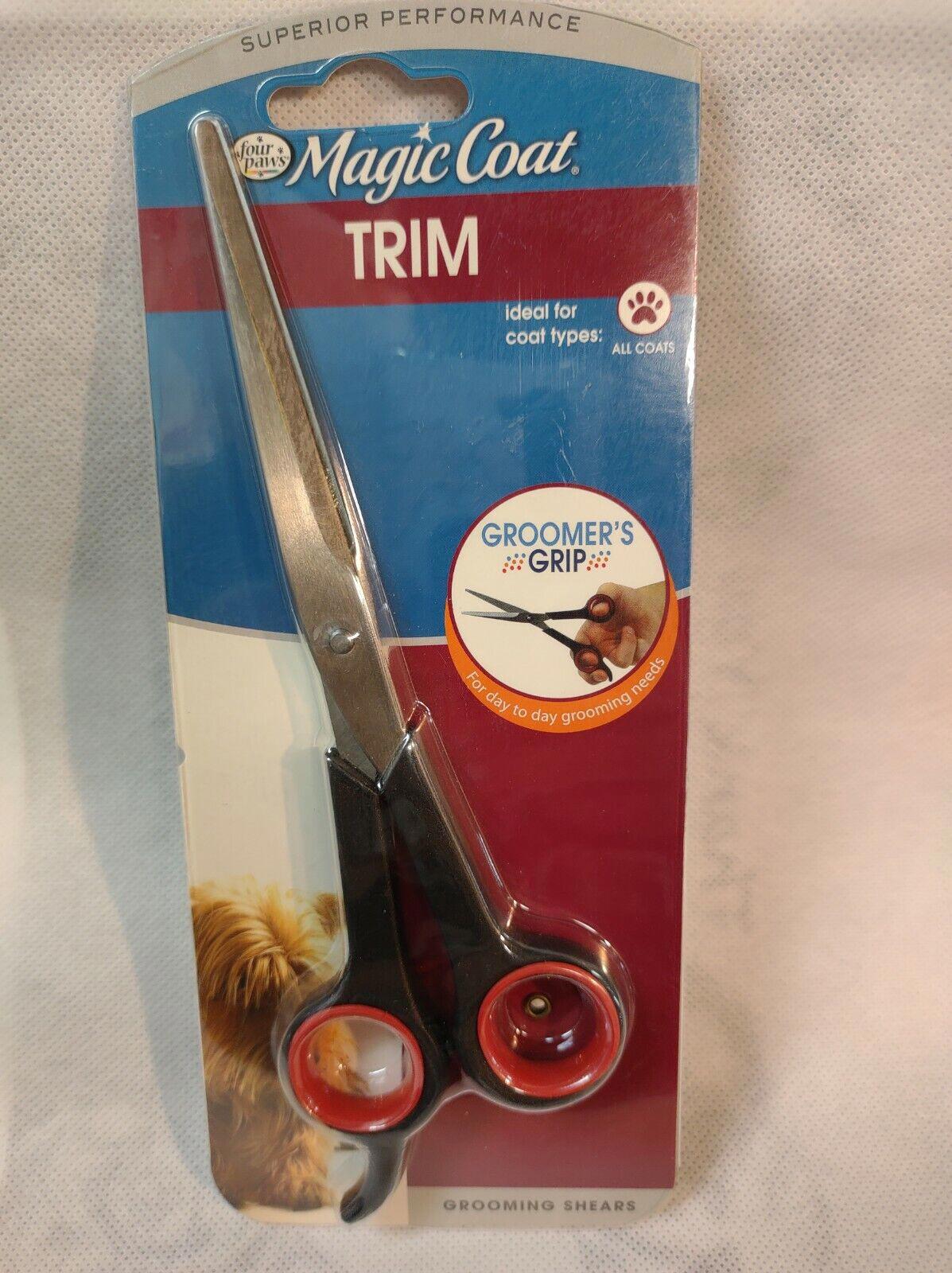 Magic Coat Trim scissors designed for grooming pets, featuring a comfortable grip and sharp blades.