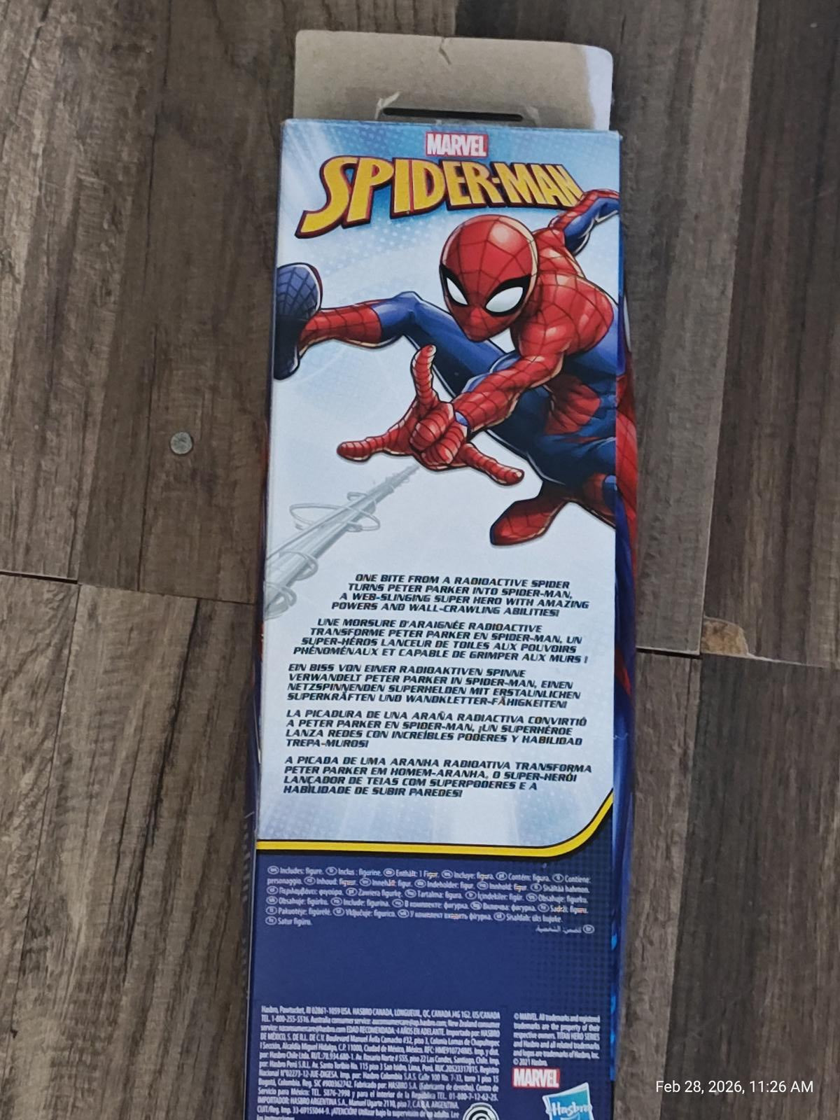 Marvel Spider-Man packaging featuring Spider-Man in action pose with web-slinging details.
