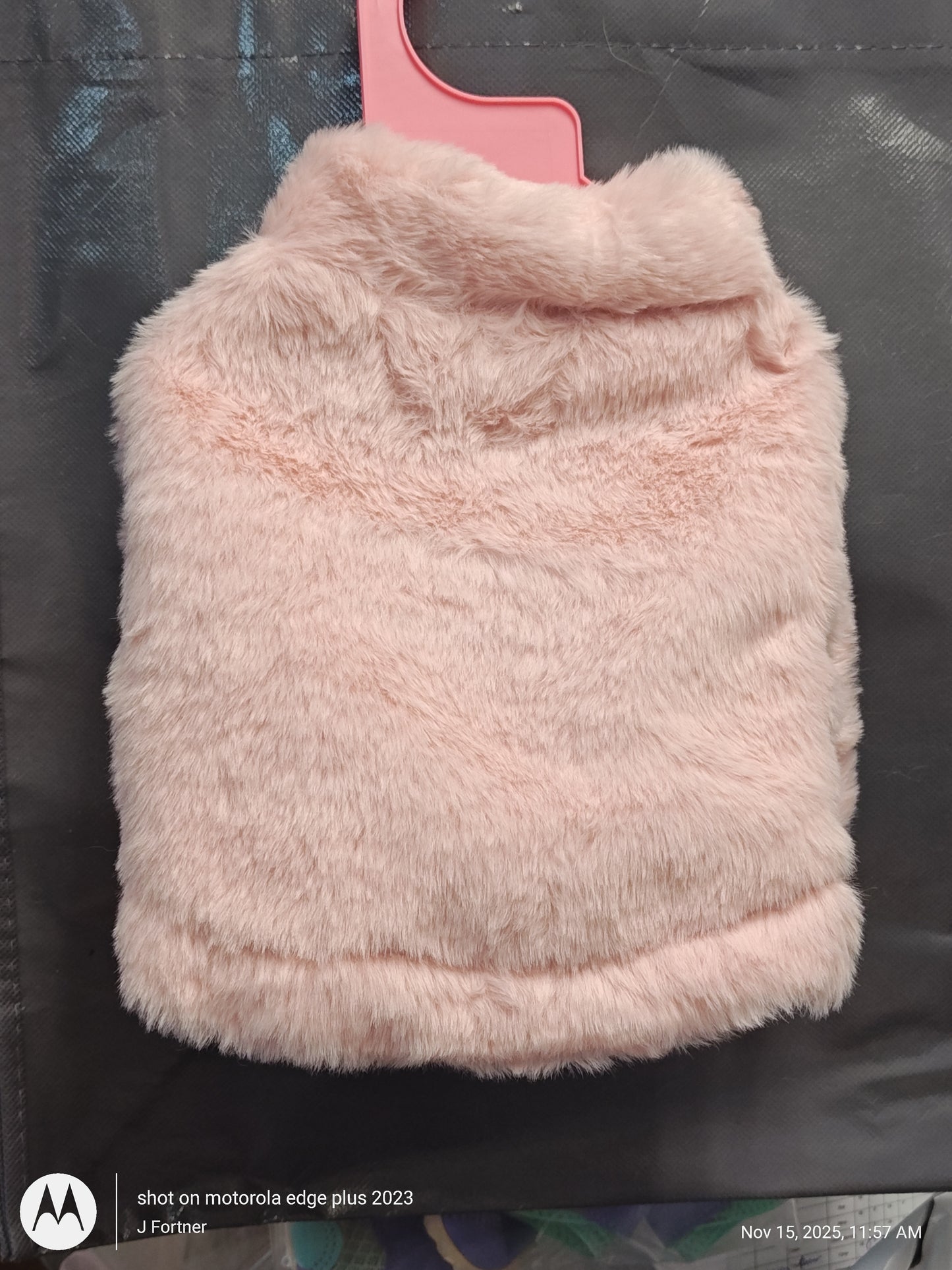 Material Edge Plus 2023 pink fluffy case with soft texture.