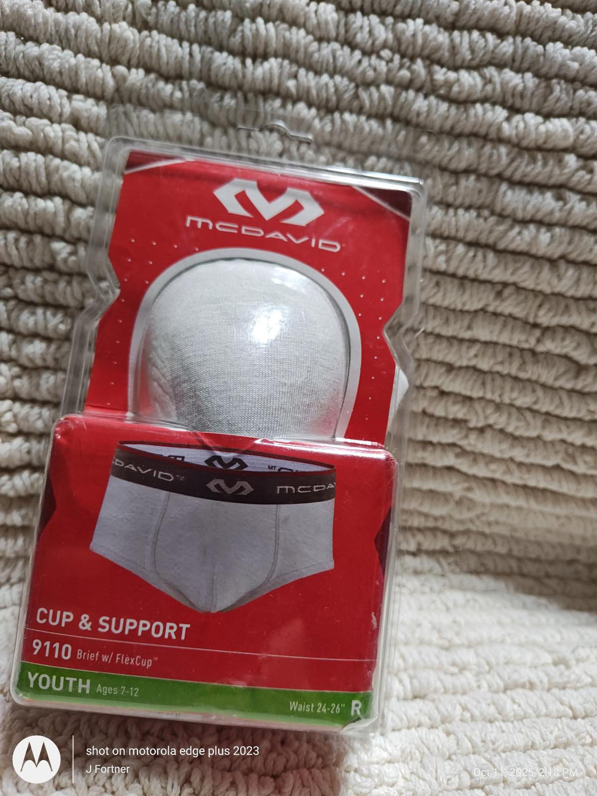McDavid Cup & Support 9110 youth athletic supporter packaging with white cup.