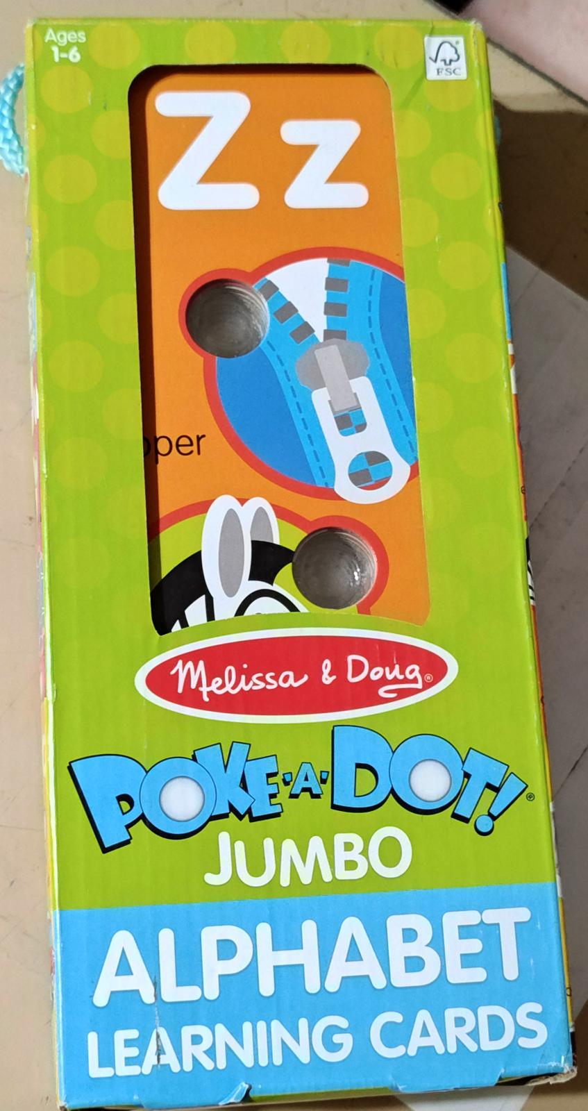 Melissa & Doug Poke-a-Dot! Jumbo Alphabet Learning Cards featuring colorful design and interactive elements.