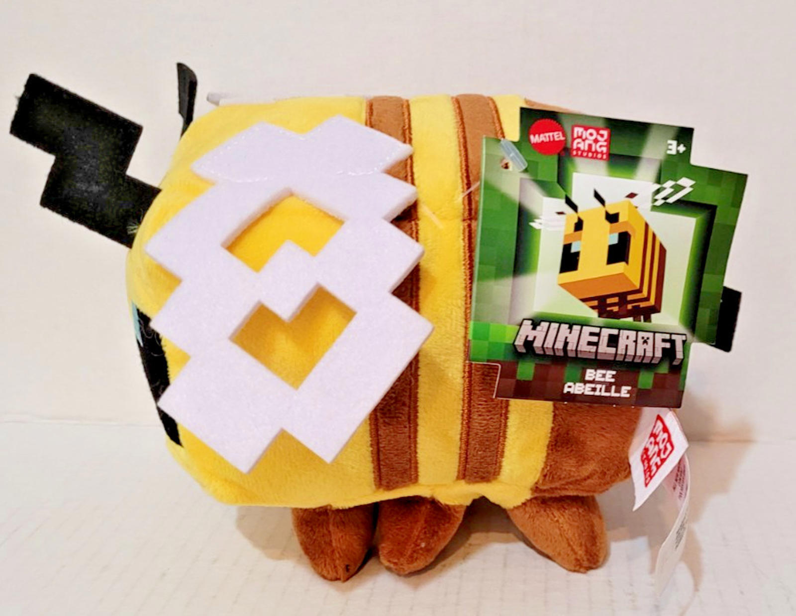 Minecraft Bee Plush Toy featuring a cute design with yellow and brown colors.