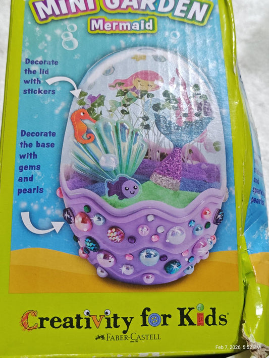 Mini Garden Mermaid kit featuring colorful decorations, gems, and stickers for creative play.